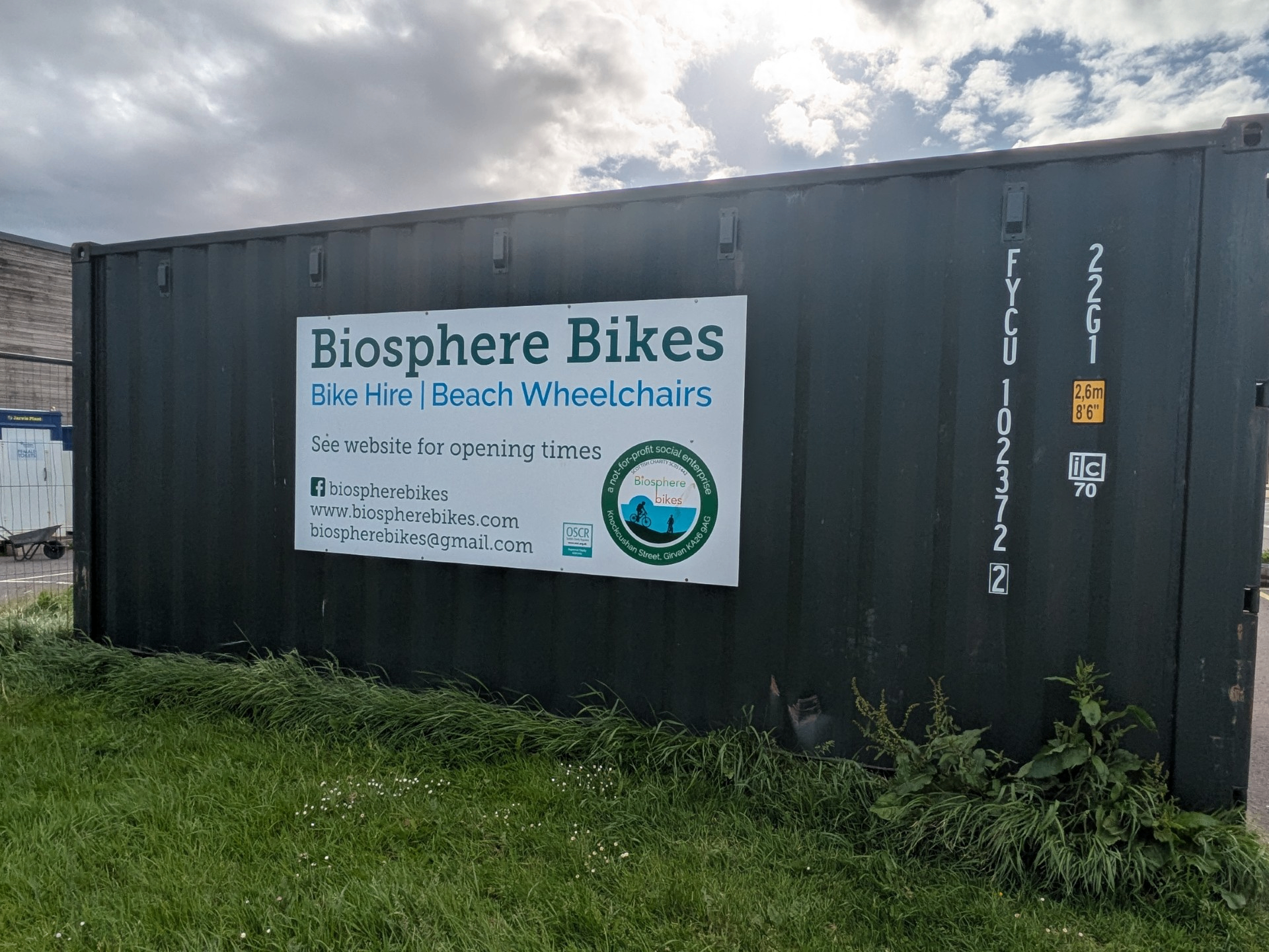 Close-up of the Biosphere Bikes signage on the existing container.