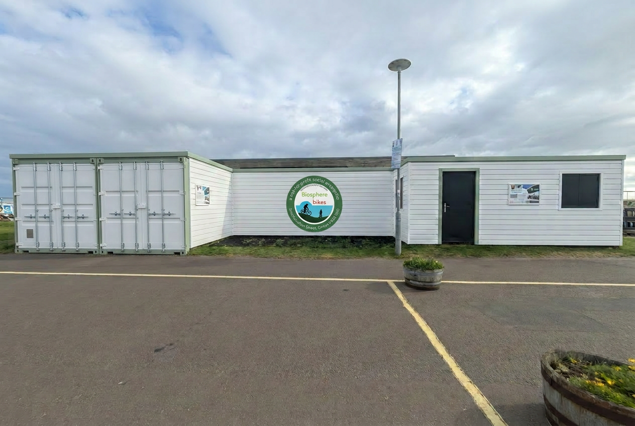 Concept visual of the same containers with composite cladding and improved signage.